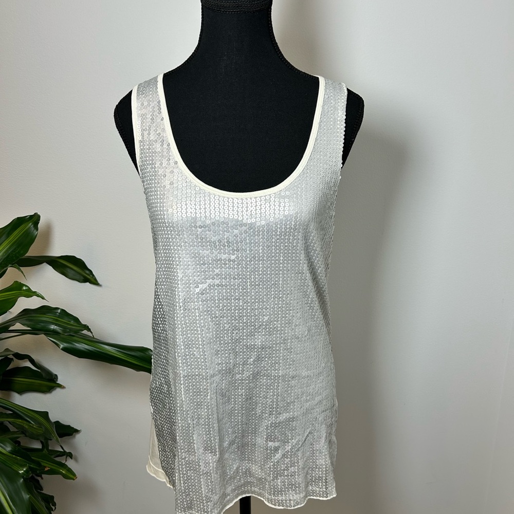 White sleeveless tank top with scoop neck and sequin features